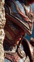 A knight stands silently against a rocky backdrop, clad in elaborate armor that glistens in the sunlight photo
