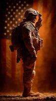 Soldier saluting proudly with American flag backdrop during sunset in a desert environment photo