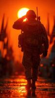 Soldier saluting at sunset during military ceremony with flags in background photo