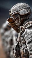 Soldiers stand in salute at military training exercise in dusty terrain during midday photo
