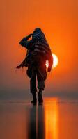 Soldier saluting at sunset with American flag draped in a serene landscape photo