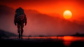Soldier walks towards sunset with American flag draped over shoulders during a peaceful moment in nature photo