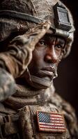 Soldier saluting with determination during a military ceremony in a rugged environment photo