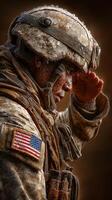 Soldier saluting in a rain-soaked environment during a military operation at dawn photo