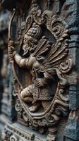 Intricate stone carving of a warrior archer demonstrating ancient craftsmanship from an Indian temple photo