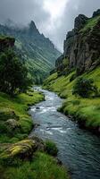 Lush green valley with a winding river under cloudy skies in a tranquil mountain landscape photo
