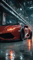High-performance red sports car parked in an industrial garage with dramatic lighting and reflections on the floor photo