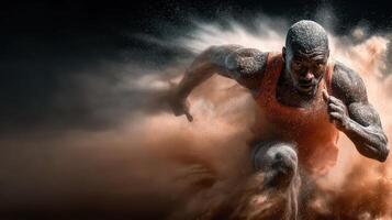 Sprinting athlete races through a cloud of dust on a dark track at sunset photo