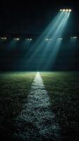 Bright stadium lights illuminate a football field in anticipation of an exciting match at night photo