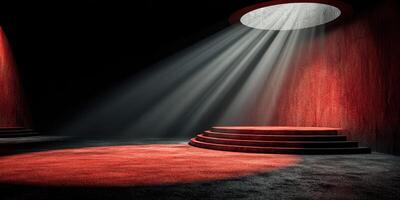 Dramatic illuminated stage with red ambiance and spotlight in a dark setting photo