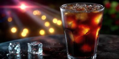 Refreshing drink with ice served in a glass at a lively gathering in the evening photo