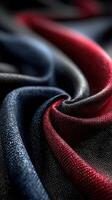 Soft fabric with shimmering textures in deep blue and rich red hues showcased in a close-up view photo
