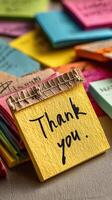 Colorful sticky notes with messages of gratitude on a desk during the day in a home office setting photo