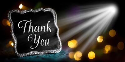 Creative thank you message displayed with decorative board and soft lighting for special occasions photo