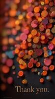 Colorful bokeh background with warm hues conveying a message of gratitude and appreciation photo