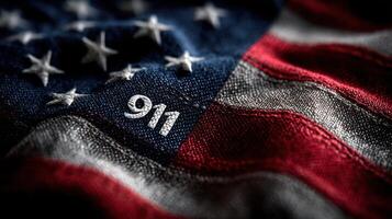 American flag with 911 embroidered on fabric symbolizing remembrance and resilience after tragedy photo