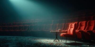 Red chairs in an empty theater reflect lingering emotions from a recent performance during the night photo