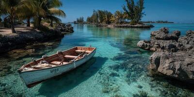 Calm turquoise waters surround a small wooden boat anchored by rocky shorelines on a sunny day in a tropical paradise photo