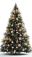 Beautifully decorated Christmas tree with gold and silver ornaments glowing at night photo