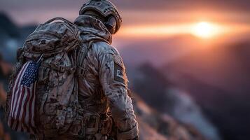 Astronaut standing on a rocky terrain gazing at the sunset over distant mountains photo