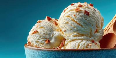 Delicious bowl of creamy vanilla ice cream garnished with crunchy nuts against a vibrant blue background photo