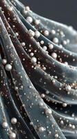 Elegant drapery adorned with pearls and golden accents in a close-up shot photo
