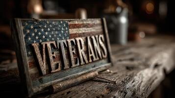 Wooden veterans sign featuring American flag detail on a rustic table in a veteran recognition center photo