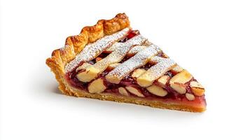 A slice of pie with a piece of almond crust photo