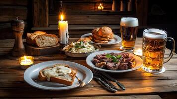A table with a table cloth and a bunch of food photo