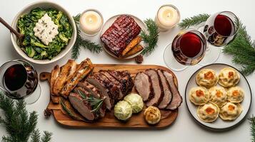 A table with meat, bread, and wine photo