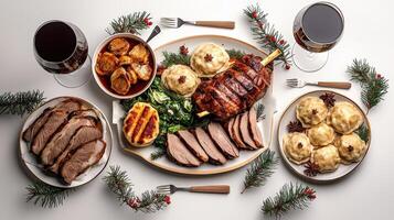A table with meat, potatoes and wine photo