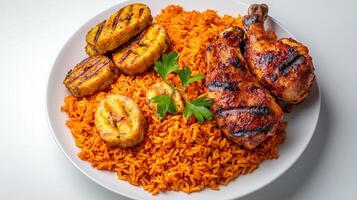 A plate of food with rice, chicken and bananas photo