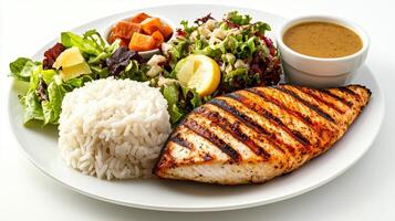 Grilled chicken breast with rice and salad photo