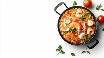 A pan with shrimp and rice on top of a white background photo