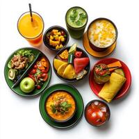 Various types of food on plates and cups photo