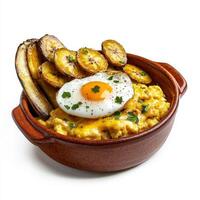 A bowl of food with eggs, potatoes and a fried egg photo