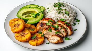Chicken, rice and avocado on a white plate photo