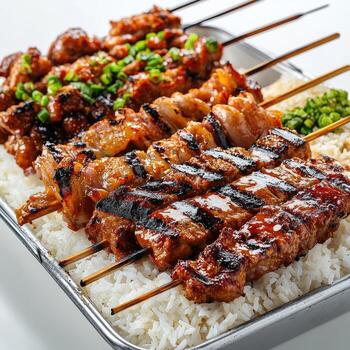 A tray of skewers with meat and rice photo