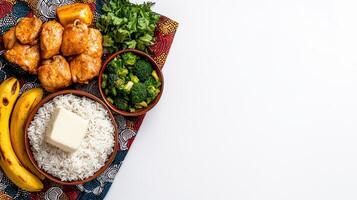 A plate of food with rice, bananas, and chicken photo