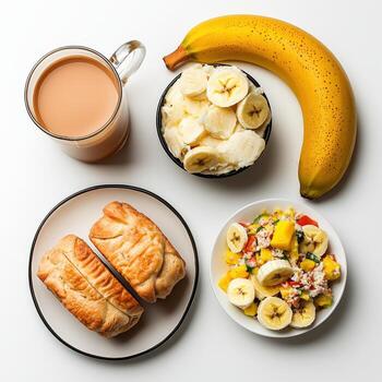 A table with a banana, bread, and a cup of coffee photo