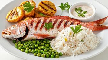 A plate of food with rice, peas, and a fish photo