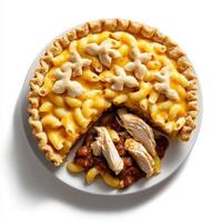A plate topped with a macaroni and cheese pie photo
