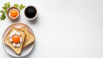 Fried eggs on toast with a cup of coffee and a spoon photo