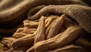 Dried Ashwagandha Roots with Burlap in Rustic Setting - Herbal Remedy photo