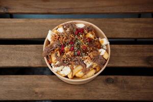 Poutine fries with chees and pulled pork photo