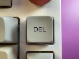 Gray delete key button of a computer keyboard. Macro photography. flay lay photo
