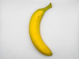 Yellow bananas isolated on a white background, very appetizing fresh fruit, copy space, flat lay, top view photo