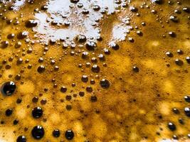 The surface of the hot coffee. Abstract background. macro, copy space photo