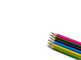 A vibrant array of colored pencils is neatly arranged and is perfect for fostering art and creativity, copy space photo