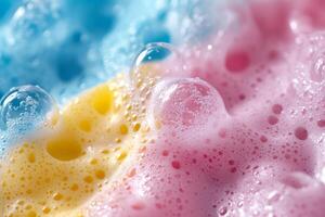 Colorful foam bubbles creating abstract pattern on gradient background photo
